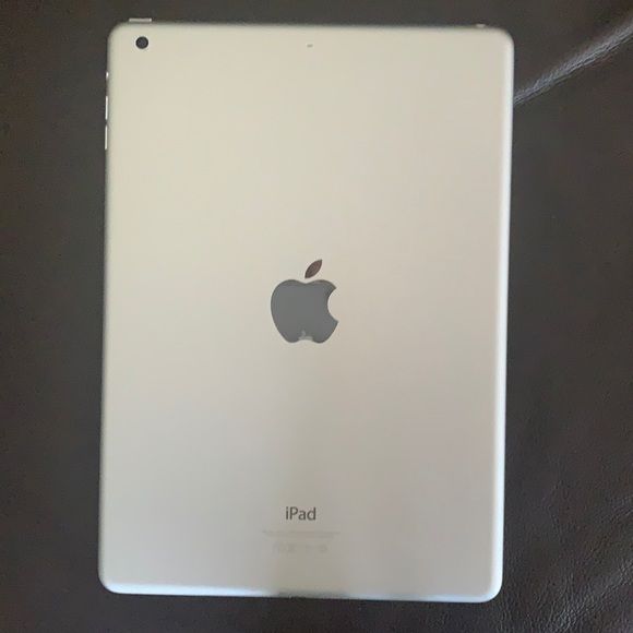 Apple iPad Air 1st Generation back view showing premium silver aluminum chassis with Apple logo