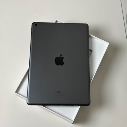 Apple iPad 8th Generation Space Gray back view in original white box on white surface