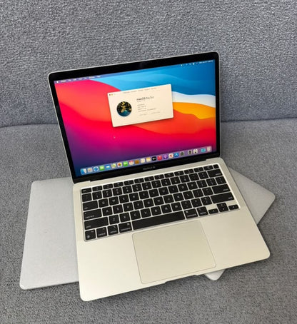 MacBook Air 2017 13-inch open showing macOS display - multiple angles